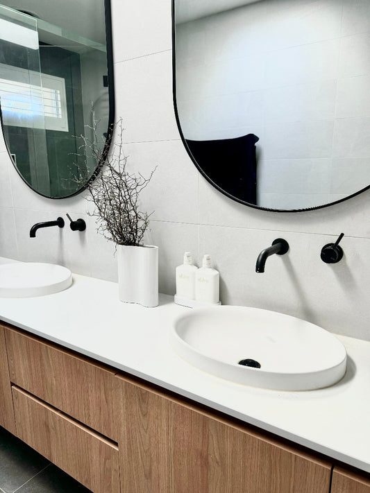 flowers in white bathroom