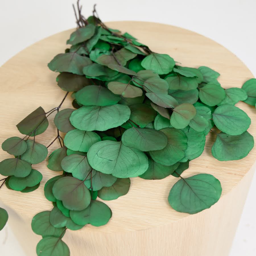 green bunch on a wooden stool