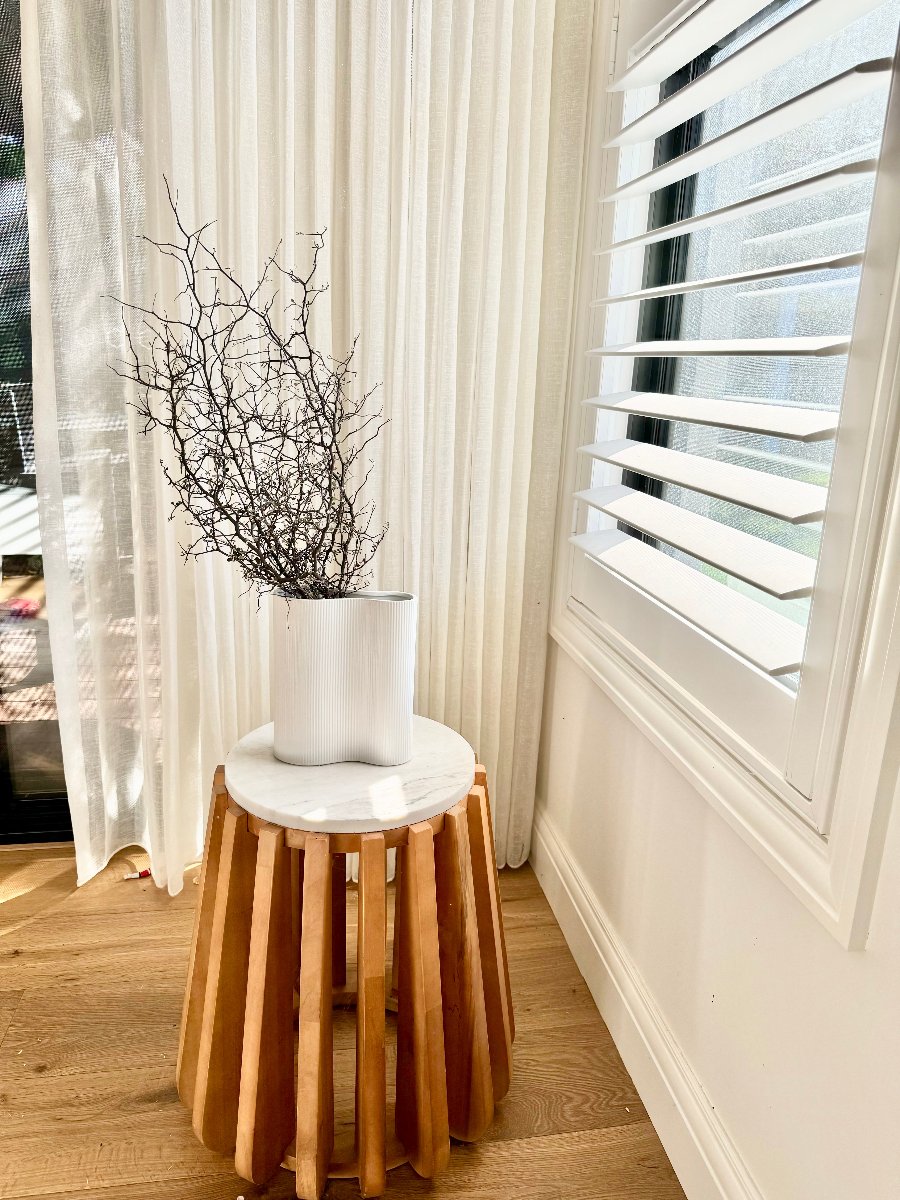 corky on a tall stool