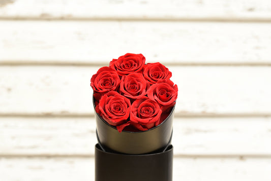 Small everlasting roses in a box