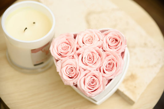 Small pink everlasting roses in heart shape box