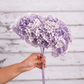 Faded Purple preserved hydrangea stem on white background