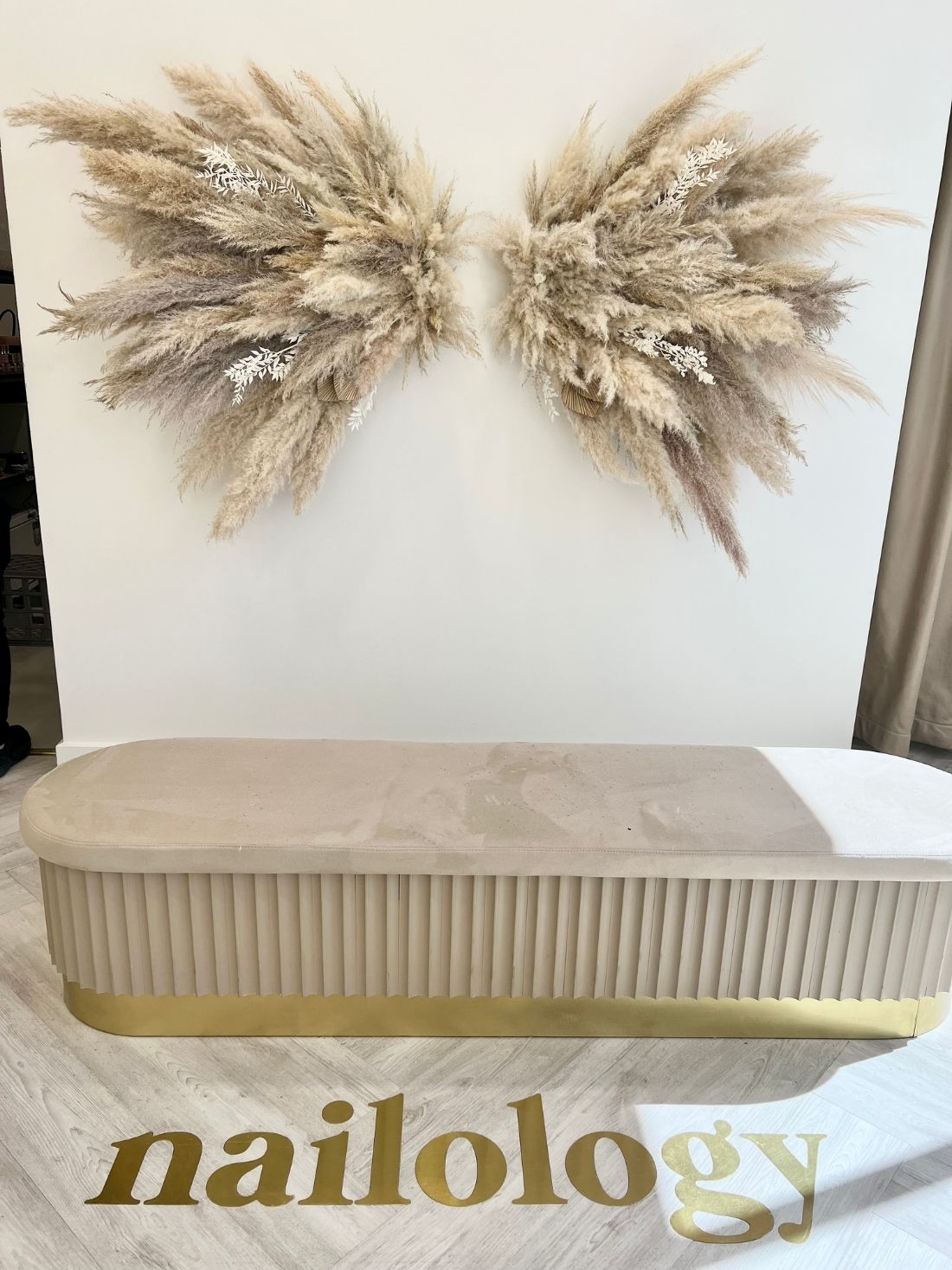 Pampas Grass Wall art in cream and tan on a nail salon wall