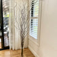 willow tree in a glass floor vase