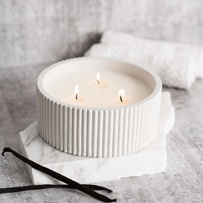 white large round candle on display