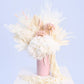 Tall White Dried Flowers in a Pink Vase