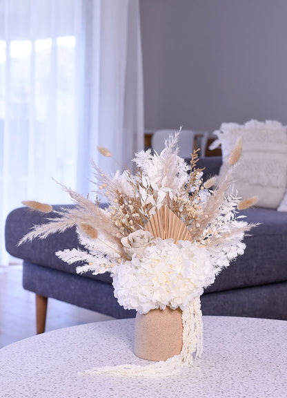 the rustic dried flowers on the coffee table