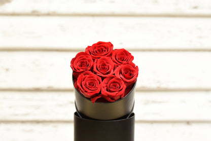 Small everlasting roses in a box