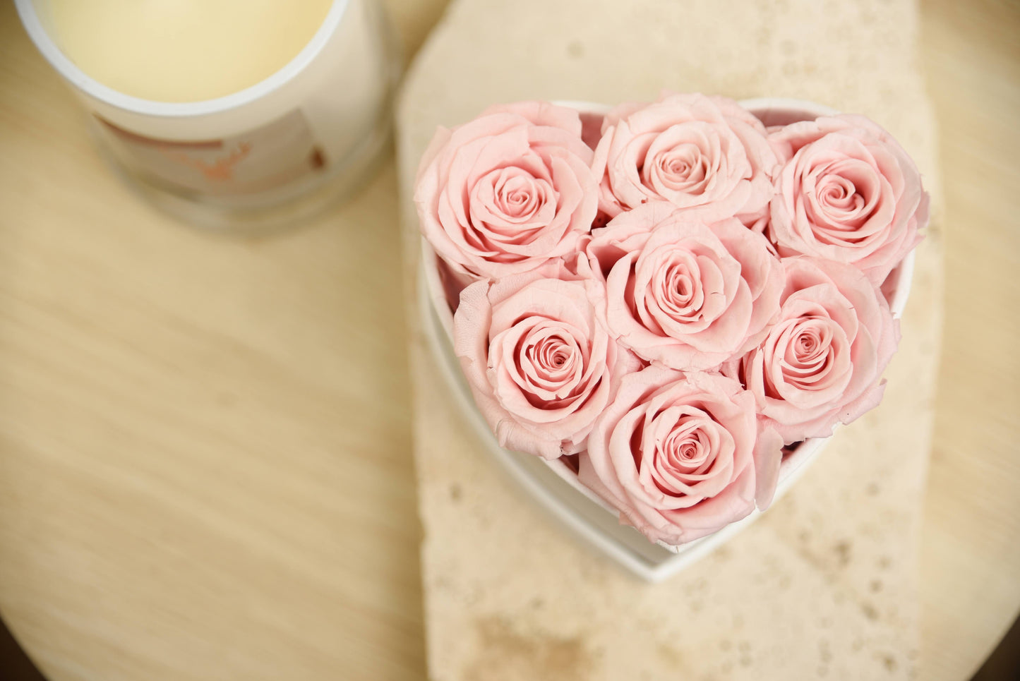 Small pink everlasting roses in heart shape box